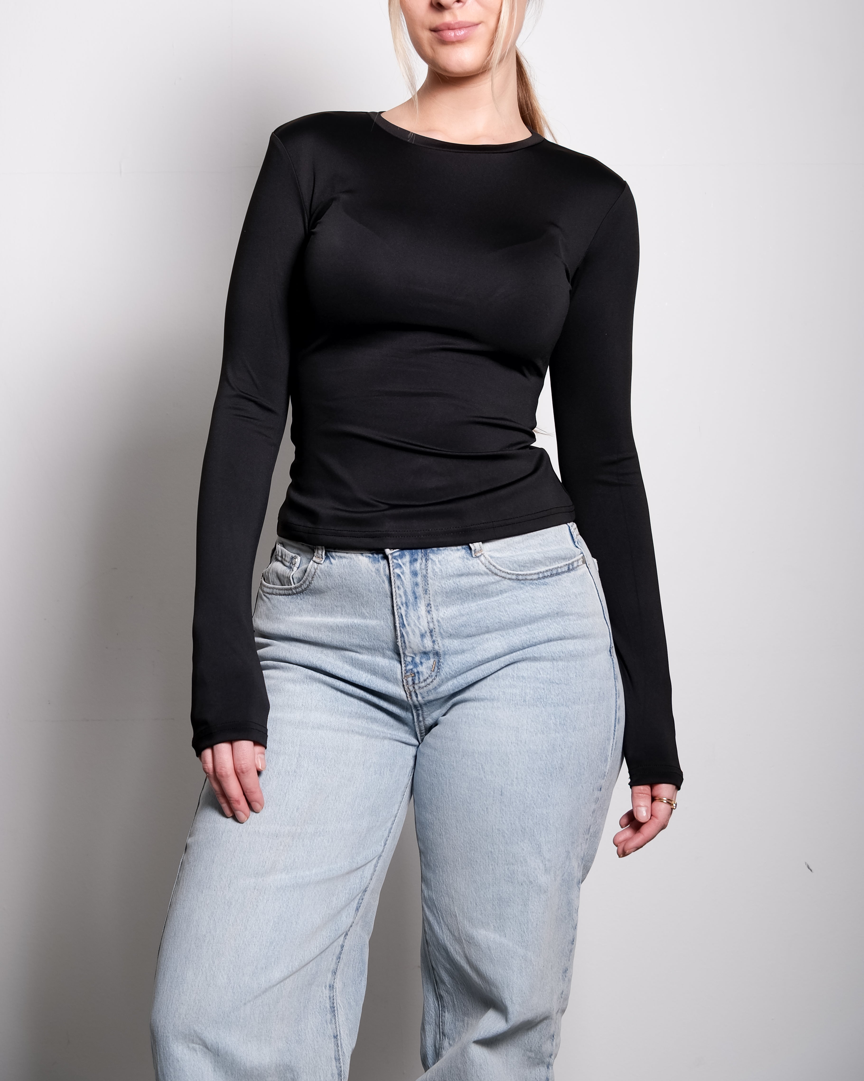 SEISHIKI STUDIO Stretchy topje met lange mouwen, zwart