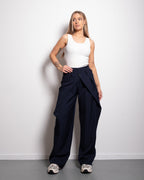 SEISHIKI STUDIO stretchy back pleated front button striped pants dark blue