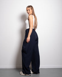SEISHIKI STUDIO stretchy back pleated front button striped pants dark blue
