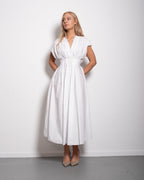 Shape enhancing pleated shortsleeve front tie dress white