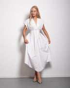 Shape enhancing pleated shortsleeve front tie dress white