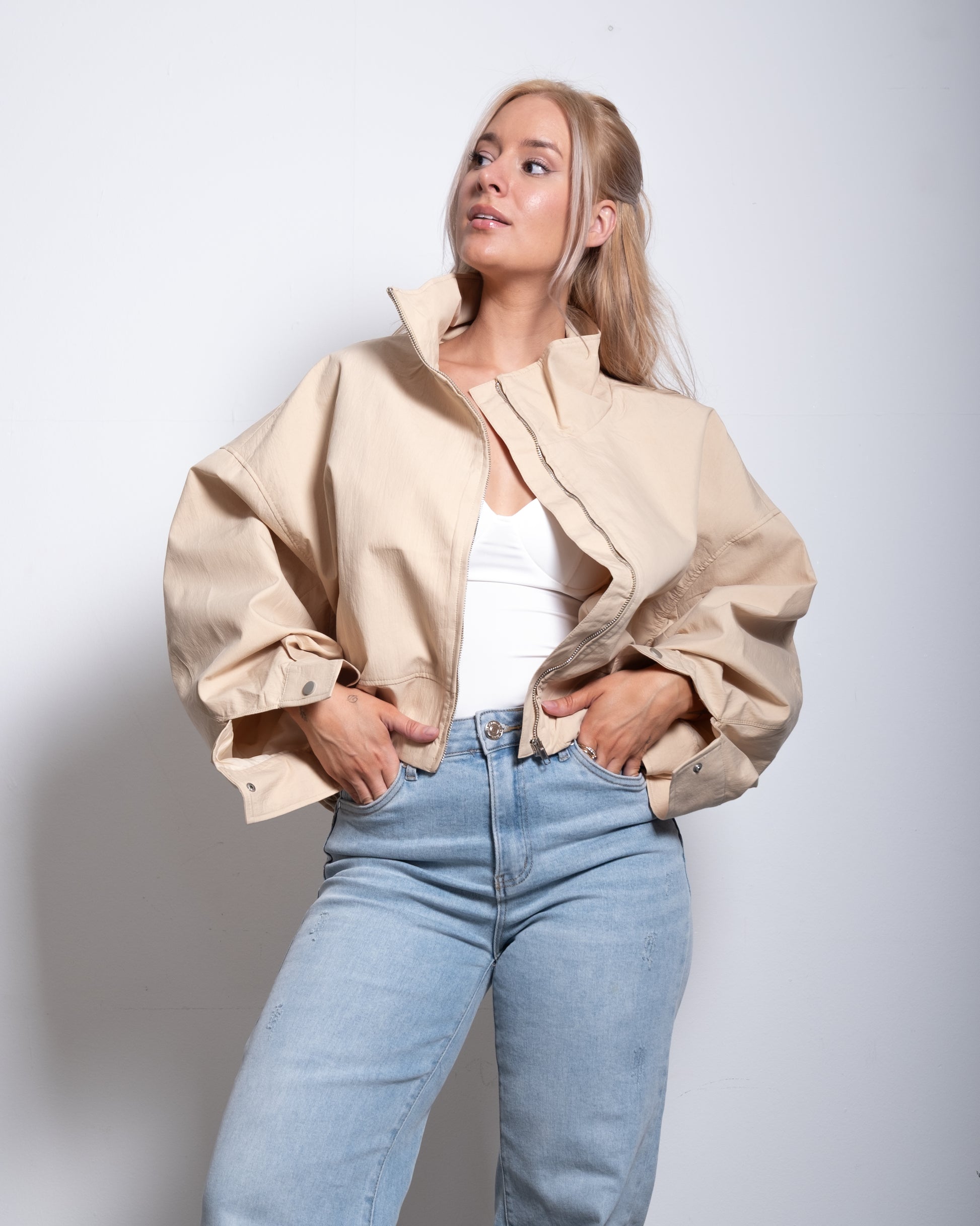 SEISHIKI STUDIO cropped high neck oversized windbreaker jacket beige