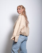 SEISHIKI STUDIO cropped high neck oversized windbreaker jacket beige
