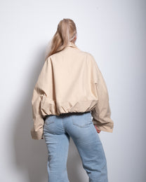 SEISHIKI STUDIO cropped high neck oversized windbreaker jacket beige
