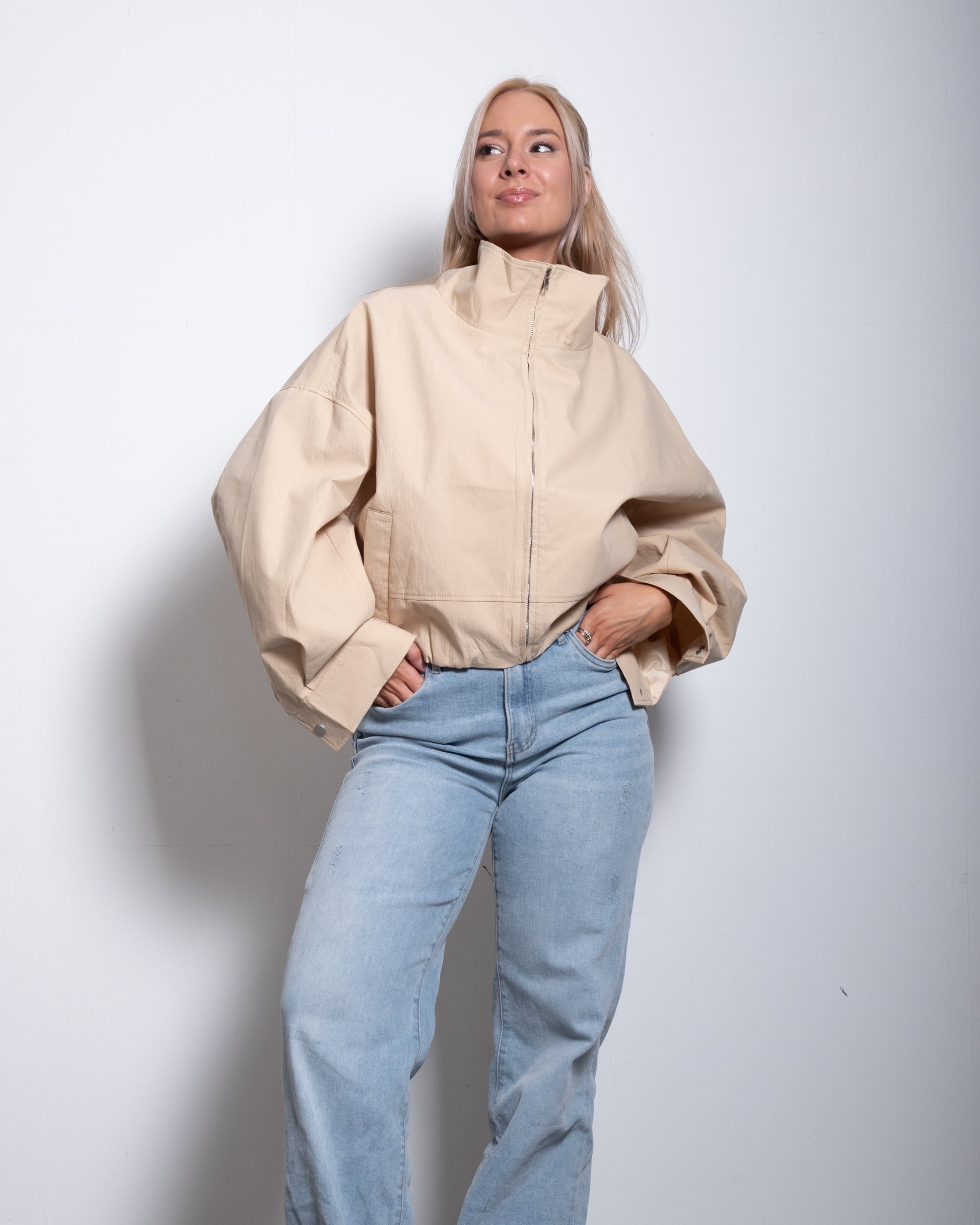 SEISHIKI STUDIO cropped high neck oversized windbreaker jacket beige