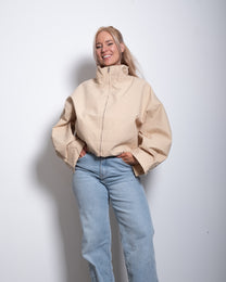SEISHIKI STUDIO cropped high neck oversized windbreaker jacket beige