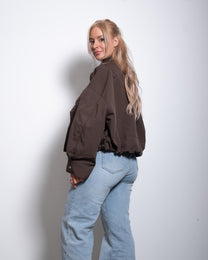 SEISHIKI STUDIO cropped high neck oversized windbreaker jacket brown