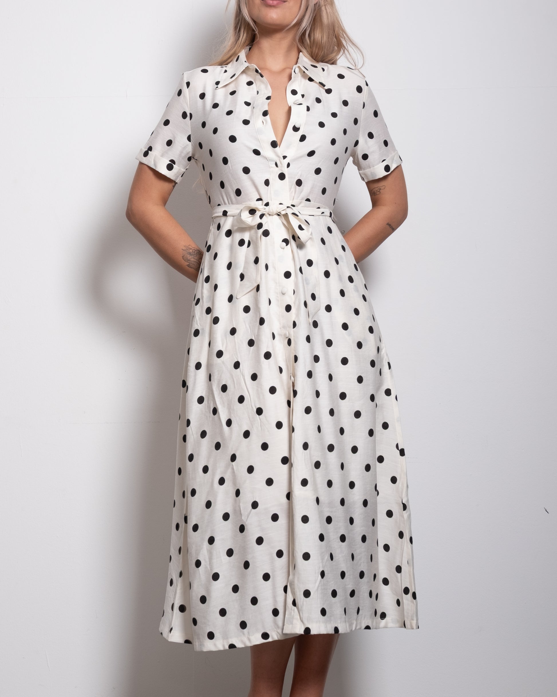 cream shortsleeved polkadot dress with belt
