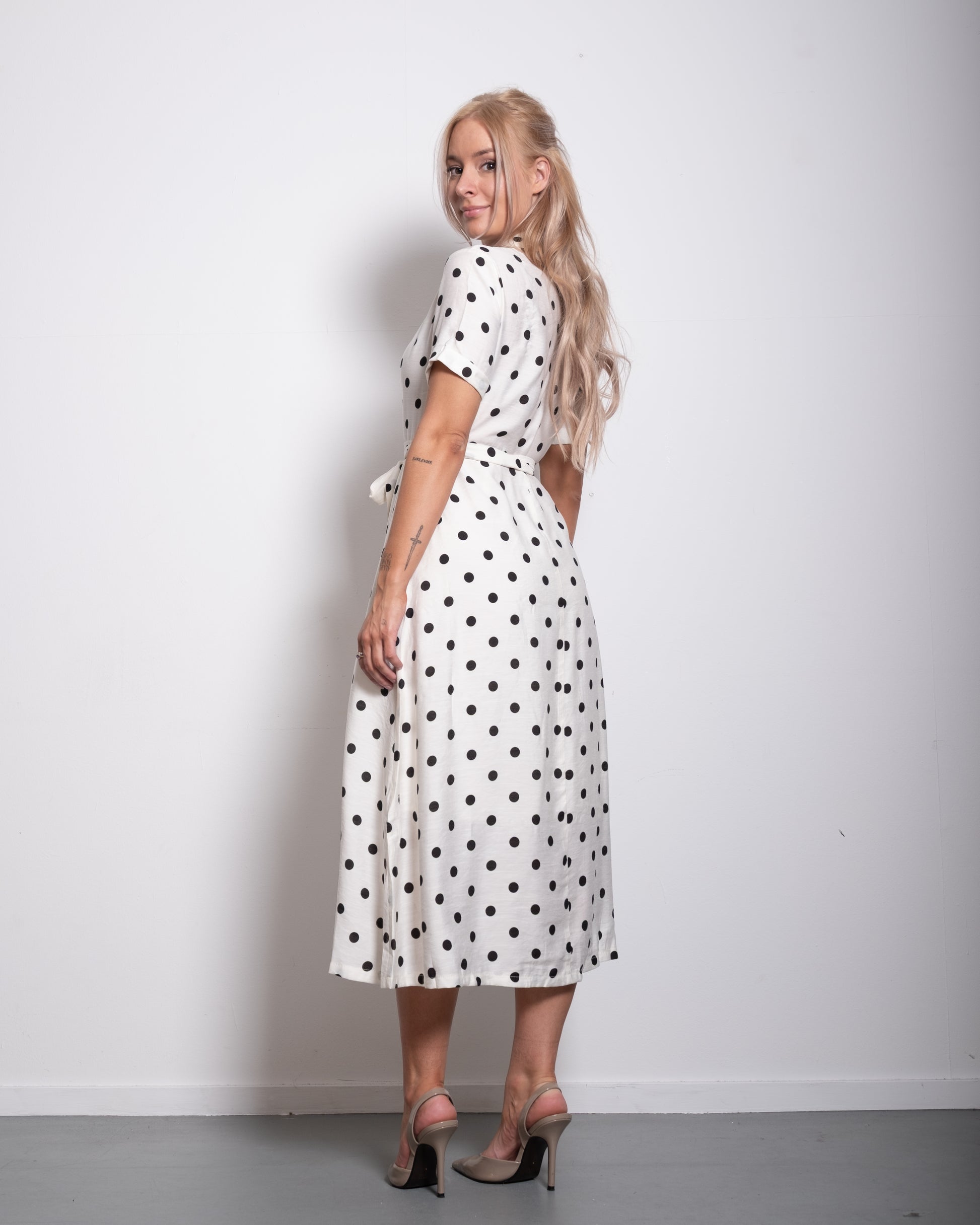cream shortsleeved polkadot dress with belt