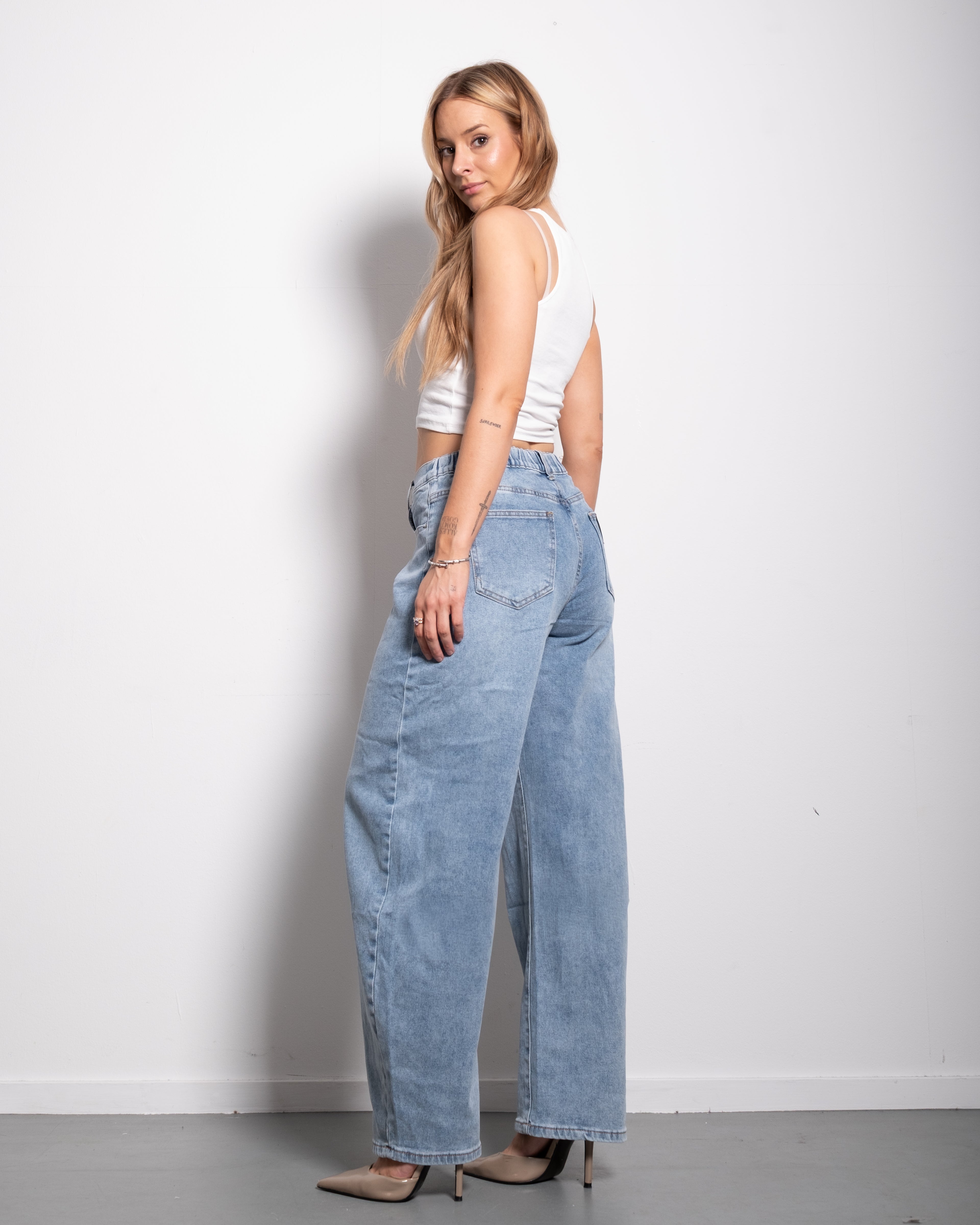 Medium Wash With Stretchy Back Balloon Jeans With Brown Patch  | SEISHIKI STUDIO