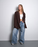 BLAZER MET ZIJKNOPPEN EN DOORSPLITSE RUG, BRUIN